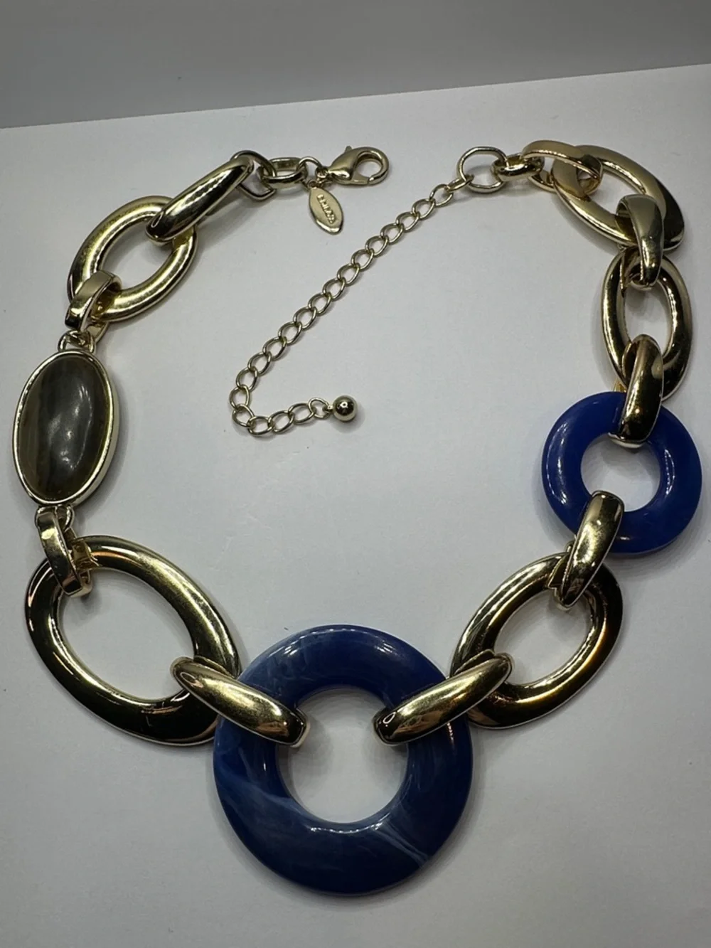 Chico's Gold-Tone Link Necklace with Deep Blue Swirled Lucite Rings - Picture 2 of 5